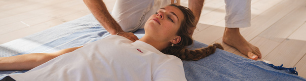 Explore the foundational principles and techniques of Thai Yoga Bodywork on the mat.